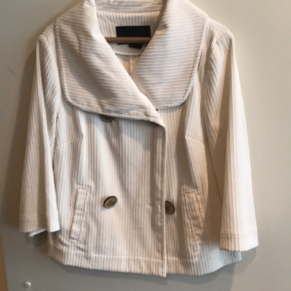 White jacket and pant suit